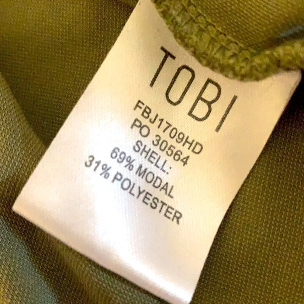 TOBI SETTING FIRES PLUNGING ROMPER IN OLIVE L